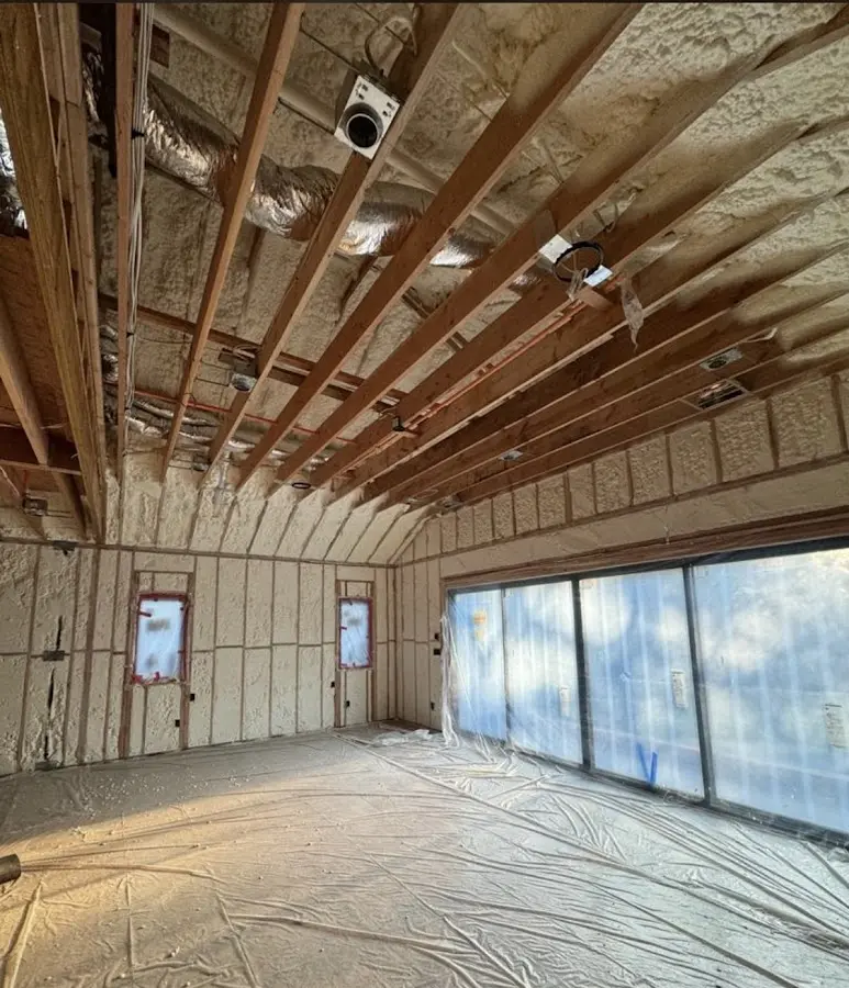 Interior walls and ceiling insulated with spray foam during new construction in Ellsworth
